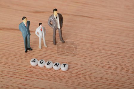 Photo for An agent is a person, organization, or entity that is authorized to act on behalf of another - Royalty Free Image