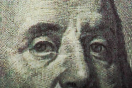 Foto de Vista de cerca un retrato de Benjamin Franklin en el frente del billete de dinero del USD - Imagen libre de derechos