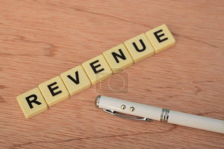 Photo for Revenue describes income generated through business operations, while profit describes net income after deducting expenses from earnings. Revenue can take various forms, such as sales, income from fees, and income generated by property. - Royalty Free Image