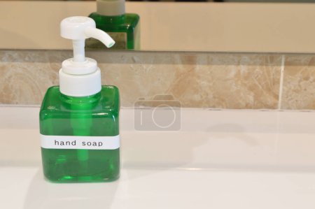 Photo for The view of the hand soap bottle offers a convenient and hygienic solution for keeping hands clean - Royalty Free Image