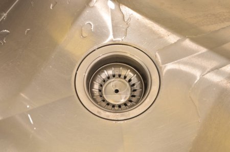 The view of the filter catching food waste in the sink