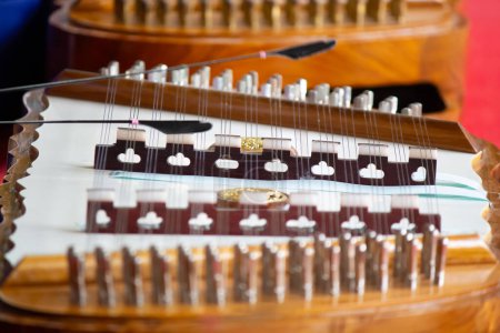 Photo for Close up of a musical instrument in the foreground with a blurred background. Traditional Thailand musical instrument - Royalty Free Image