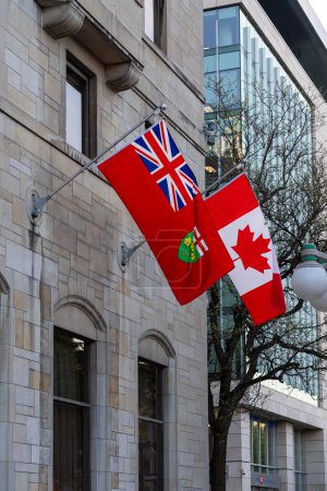 Photo for Ottawa, Canada - May 16, 2024: Canadian and Ontario flags on the wall of Lord Elgin hotel building in downtown. - Royalty Free Image