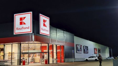 Photo for HUSTOPECE, CZECH REPUBLIC - DECEMBER 14, 2023: Kaufland logo on hypermarket from German chain, part of Schwartz Gruppe which also owns Lidl. It operates over 1,500 stores in Germany, Croatia, the Czech Republic, Slovakia, Poland, Romania, Bulgaria an - Royalty Free Image