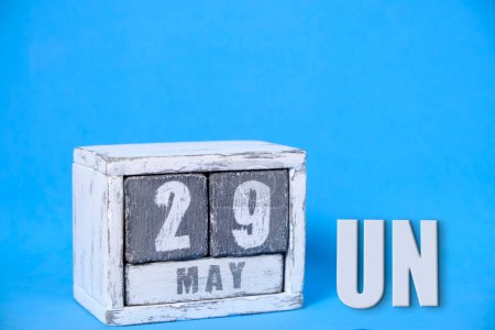 Foto de 29 de mayo, calendario fondo azul. Concepto Día Internacional de los Pacificadores de la ONU - Imagen libre de derechos
