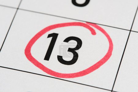 Photo for 13th number on the calendar is marked in red - Royalty Free Image