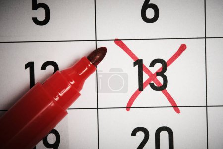 Photo for 13th day in the calendar is marked with a red marker - Royalty Free Image