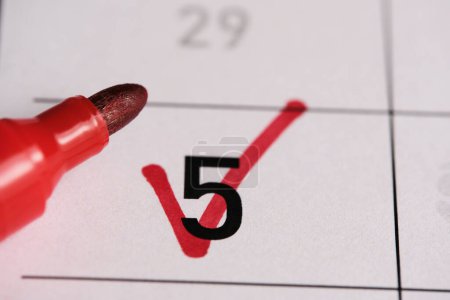 Photo for 5th day in the calendar is marked with a red marker - Royalty Free Image