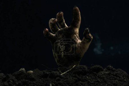 Halloween zombie hand isolated on black background. Horror Halloween concept