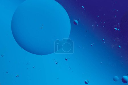 Fondo azul oscuro con burbujas flotantes azules y púrpuras, formando un diseño abstracto tranquilo y sereno con una sensación tranquila