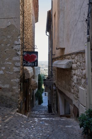 Photo for Saint-Paul de Vence, France  August 11, 2023 - typical narrow street with tourists on a beautiful summer day - Royalty Free Image