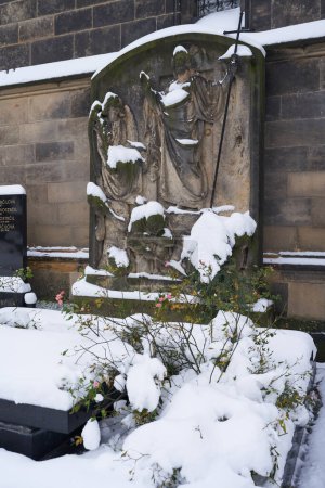 Photo for Prague, Czech Republic - December 3, 2023 - Winter in Prague city. The Slavin - the Vysehrad Cemetery on a snowy  afternoon - Royalty Free Image