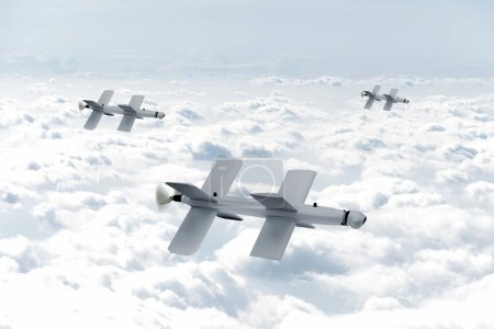 Attack by a group of unmanned military kamikaze drone "Lancet", flying in the sky above the clouds, Russian equipment. Concept: kamikaze strike reconnaissance drone attack, war in Ukraine.