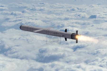 Russian cruise missile "Kalibr" flies above the clouds, smoke and fire from the nozzle of the missile. Concept: war in Ukraine, Russian missile attack, air alert.
