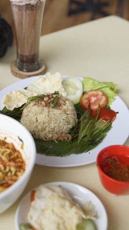 Photo for Nasi lemak, malaysian traditional food with rice - Royalty Free Image