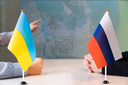 Photo for Negotiations in diplomacy. Communication between representatives of the countries of Ukraine and Russia. negotiations of diplomats, conclusion of the pact. peace talks concept. - Royalty Free Image