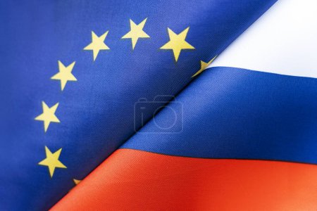 Flags European Union and Russia. The concept of international relations between countries. The state of governments. Friendship of peoples.