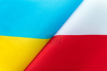 Flags Ukraine and Poland. The concept of international relations between countries. The state of governments. Friendship of peoples.