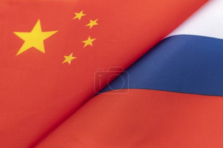 Photo for Flags of the china and Russia. The concept of international relations between countries. Sanctions against Russia. The state of governments. Friendship of peoples. - Royalty Free Image