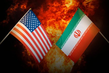 Photo for Flags of iran and United States of america against the background of a fiery explosion. The concept of enmity and war between countries. Tense political relations. - Royalty Free Image