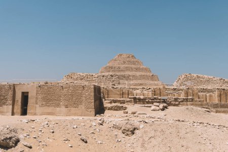 Photo for The step pyramid at Saqqara is the oldest surviving large stone building in the world. Built by the architect Imhotep in Saqqara for the burial of Pharaoh Djoser circa 2650 BC. - Royalty Free Image