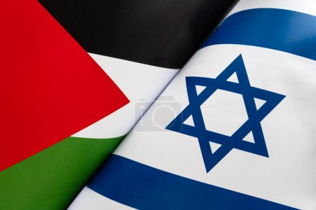 Fond des drapeaux de l'Israël et palestine. concept d'interaction ou de contre-action entre deux pays. Relations internationales. négociations politiques. guerre au Moyen-Orient