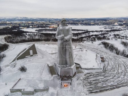 Photo for Attractions of the town. View of Monument to the Defenders of Arctic the main symbol of the town on short winter day. top aerial view, - Royalty Free Image