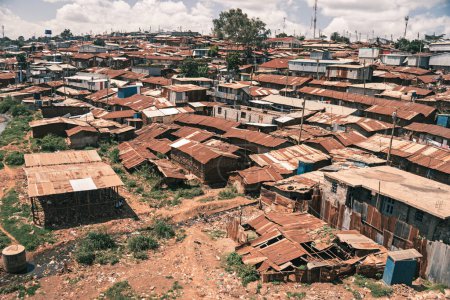 There are many poor houses in slums with high population density. The concept of poverty in third World countries.