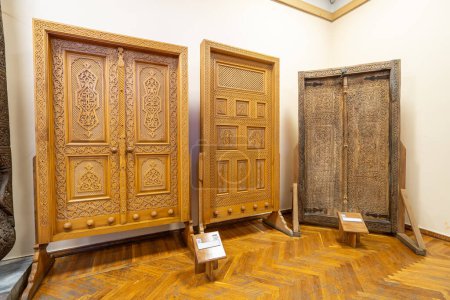 Photo for Beautiful carved wooden doors in State Museum of Applied Arts of Uzbekistan. October 28th. 2023 Tashkent, Uzbekistan. - Royalty Free Image