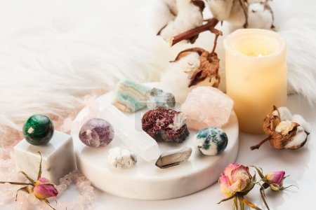 Healing Stones for Crystal Spiritual Ritual, Wicca Practice, Esoteric Witchcraft Arrangement with Burning Candles and Gemstones