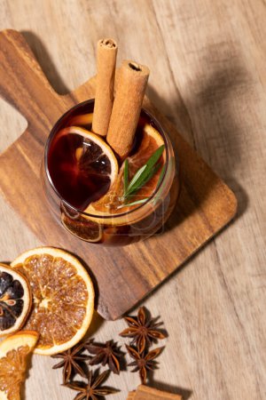 Christmas drink Vin Chaud, French mulled wine ingredients_cinnamon and dried fruits