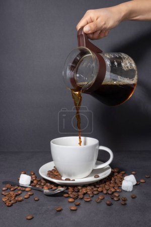 creative concept photo of coffee beans and coffee cup