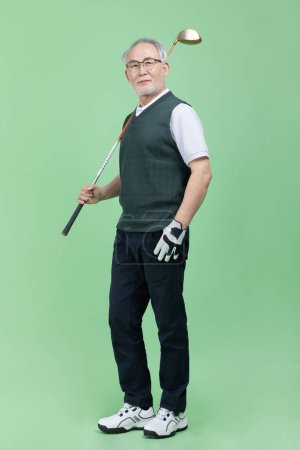 A male senior who plays golf