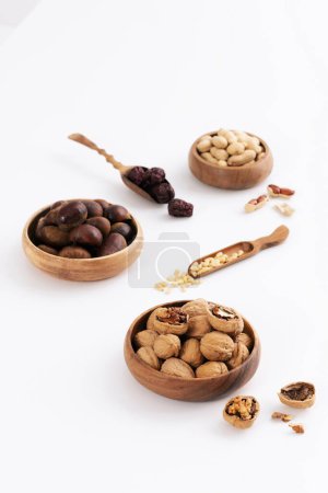 Nuts eaten during the New Year's Eve are served on plates and spoons