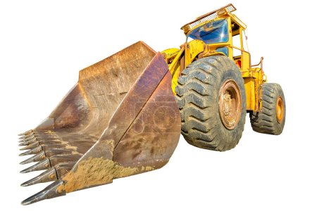 Wide angle and perspective view of heavy and powerful yellow bulldozer excavator on wheels for building work isolated on white background with copy space. Work in progress, industrial machine.