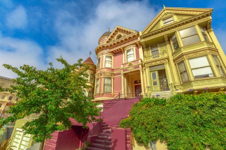 Photo for San Francisco, California, United States - August 17, 2016: colorful Victorian houses of San Francisco. Urban tourist attraction in Stainer street. - Royalty Free Image
