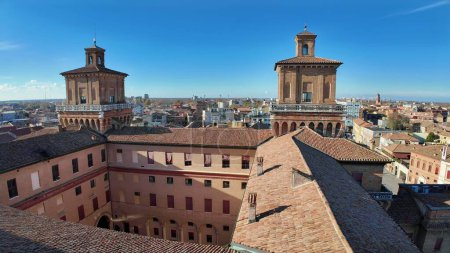 Photo for Aerial view from Ferrara Castle tower, majestic fortress that stands in the heart of Ferrara, Italy. It was built in 1385 by the Este family, who ruled the city for centuries over the Duchy of Ferrara - Royalty Free Image