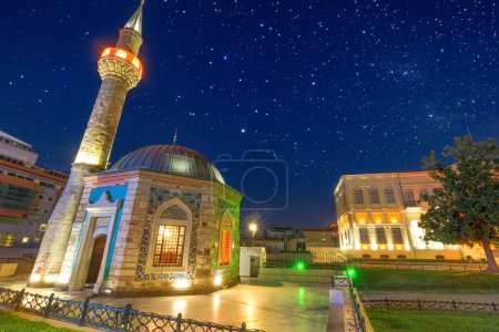Konak Mosque with octagonal shape and intricate tilework, serene oasis in Izmirs Konak Square. Built in 1755 its jewel of history.Stands as historic symbol next to Governors Mansion and Clock Tower