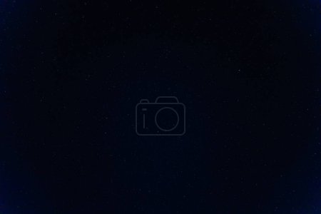 Photo for Serene night sky filled with twinkling stars above the desert of Wadi Rum, Jordan, showcasing the beauty of a desert night in April - Royalty Free Image