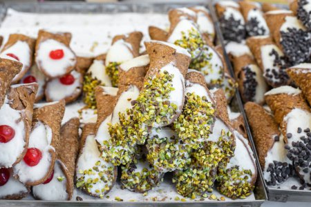 Photo for Sicilian cannolo is a typical dessert from Sicily. Sweet cream tubes. Bakery products. Organic food. High quality photo - Royalty Free Image