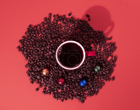 Foto de Cup of black coffee, chocolate bars and coffee beans on red background. Minimal horizontal flat lay composition, coffee culture concept - Imagen libre de derechos