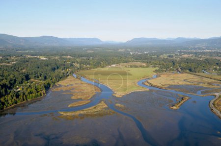 Aerial photograph of farmland in the Cowichan River estuary, Vancouver Island, British Columbia, Canada.