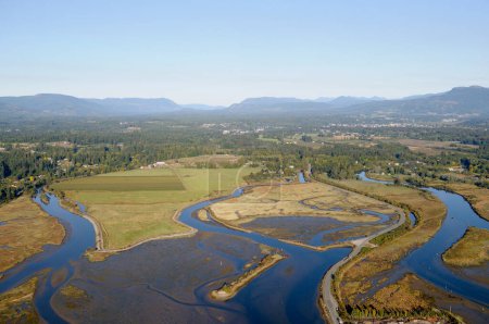 Aerial photograph of farmland in the Cowichan River estuary, Cowichan Bay, Vancouver Island, British Columbia, Canada.