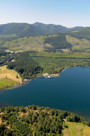 Bear Lake entering Cowichan Lake, Vancouver Island aerial photography, British Columbia, Canada.