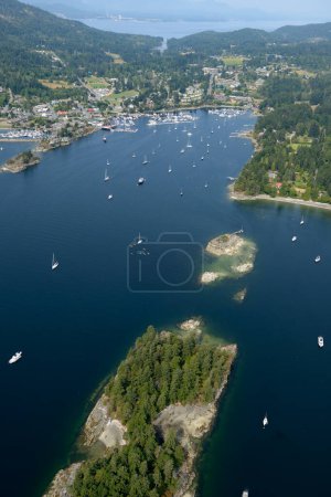 Aerial photograph of the north end of Goat Island in Ganges Harbour with Ganges in the background, Salt Spring Island, British Columbia, Canada
