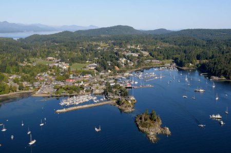 Photo for Aerial photograph of the town of Ganges with Grace Islet in the foreground, Saltspring Island, British Columbia, Canada - Royalty Free Image