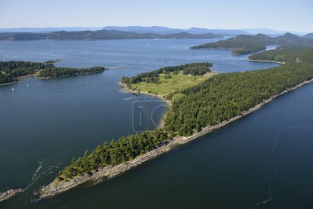 Aerial photo of Samuel Island with Plumper Sound and North Pender Island in the background, British Columbia, Canada.