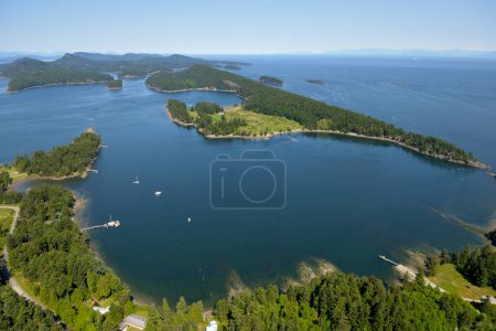 Aerial photograph of Winter Cove on Saturna Island with Samuel Island in the background. British Columbia, Canada.