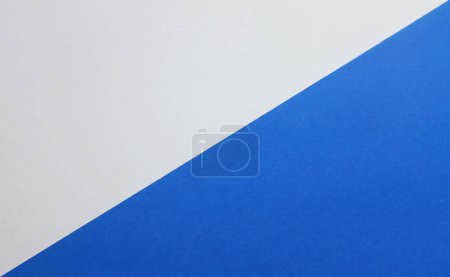 Photo for Two tone blue white paper color for background. Two color paper with Overlay on the floor And split half of the image. background.Top view with place for text - Royalty Free Image