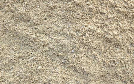 brown surface of Sand beach, Sand on beach natural texture for background.beautiful abstract spa concept banner of sea paradise island of summer days,top view